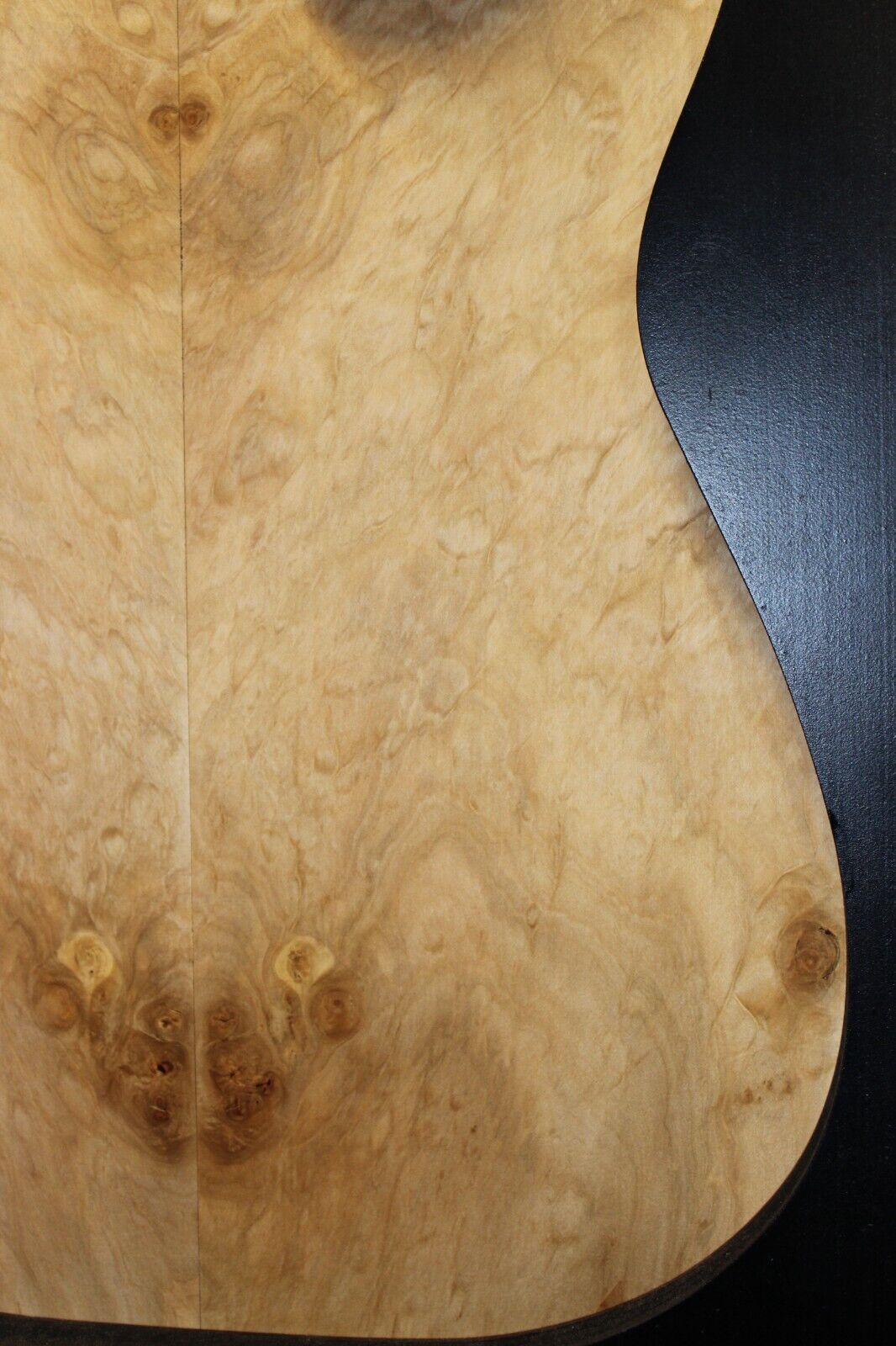 Silver maple, burl / lace figured guitar book matched top.
