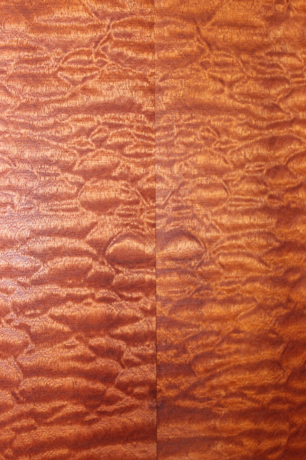 Quilted sapele electric guitar bookmatched drop top. Master grade figure.
