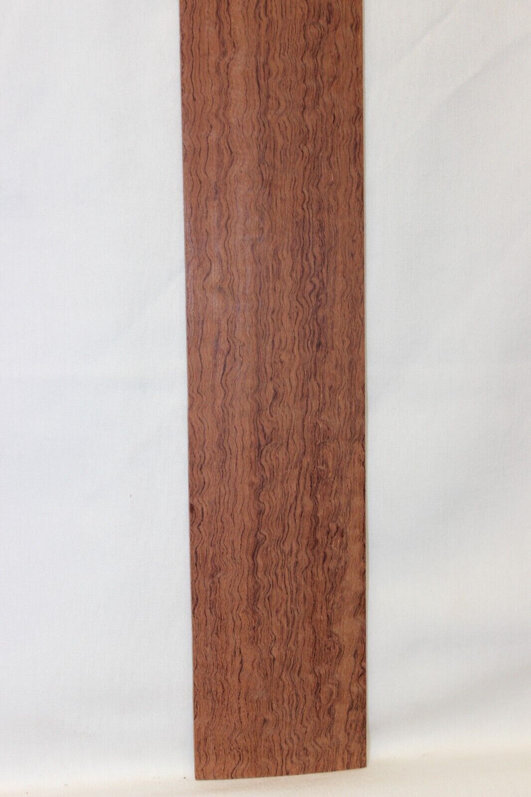 12 inch radius figured bubinga guitar fingerboard blank.