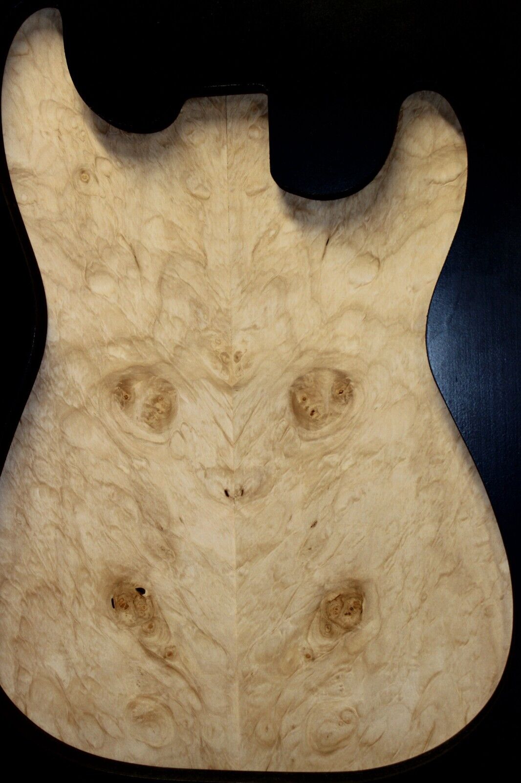 Silver maple, burl / lace figured guitar book matched top.