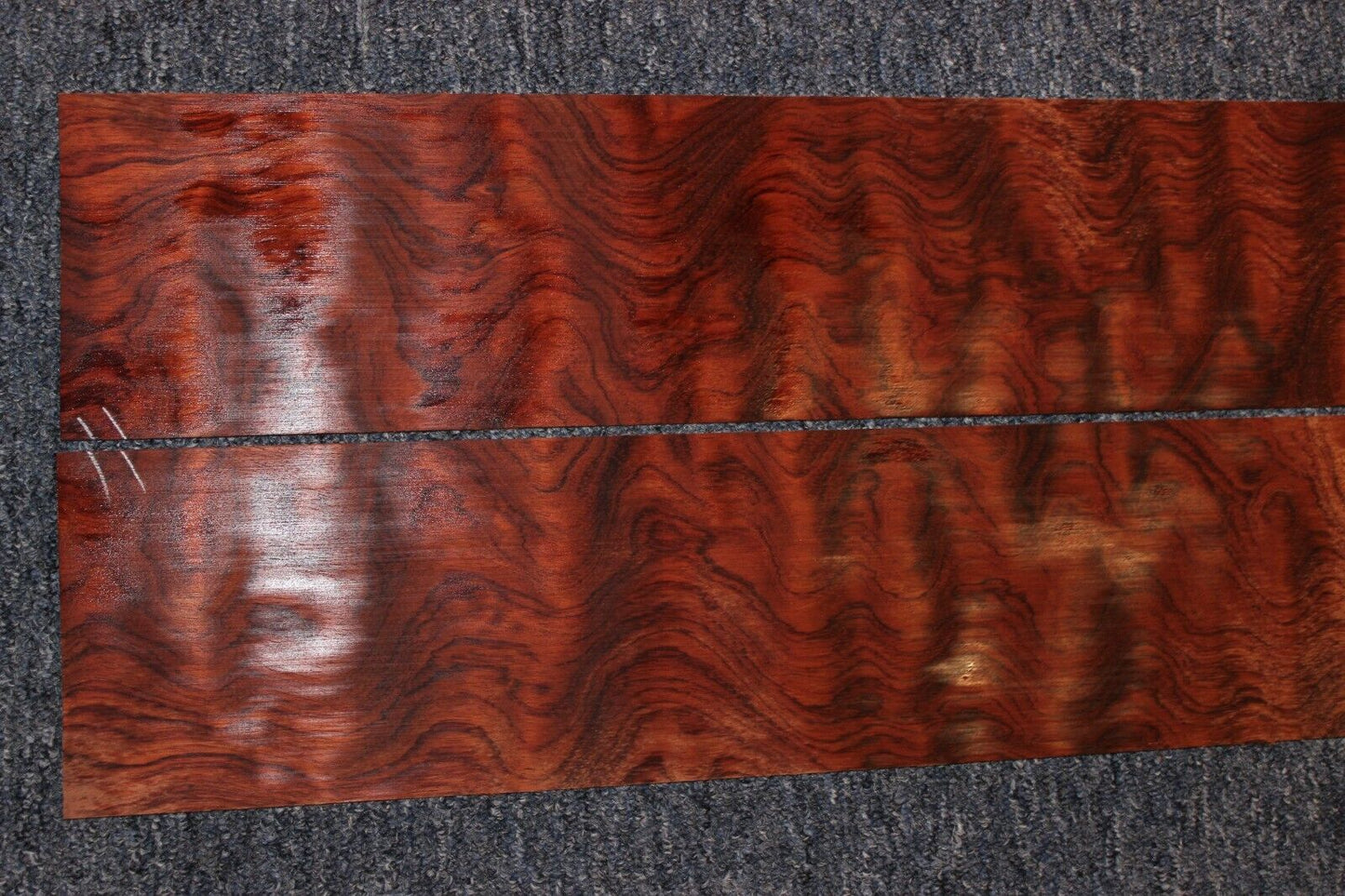 Waterfall figured bubinga back and side set. Stunning grain, color and figure.