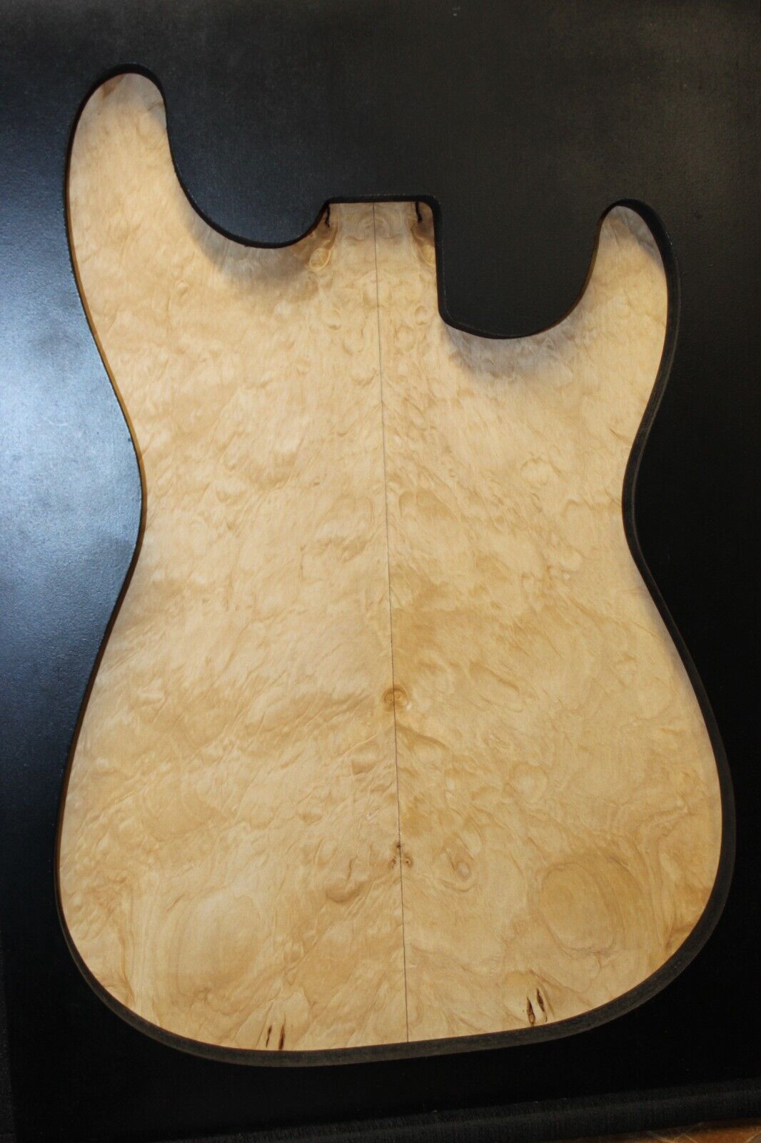 Silver maple, burl / lace figured guitar book matched top.