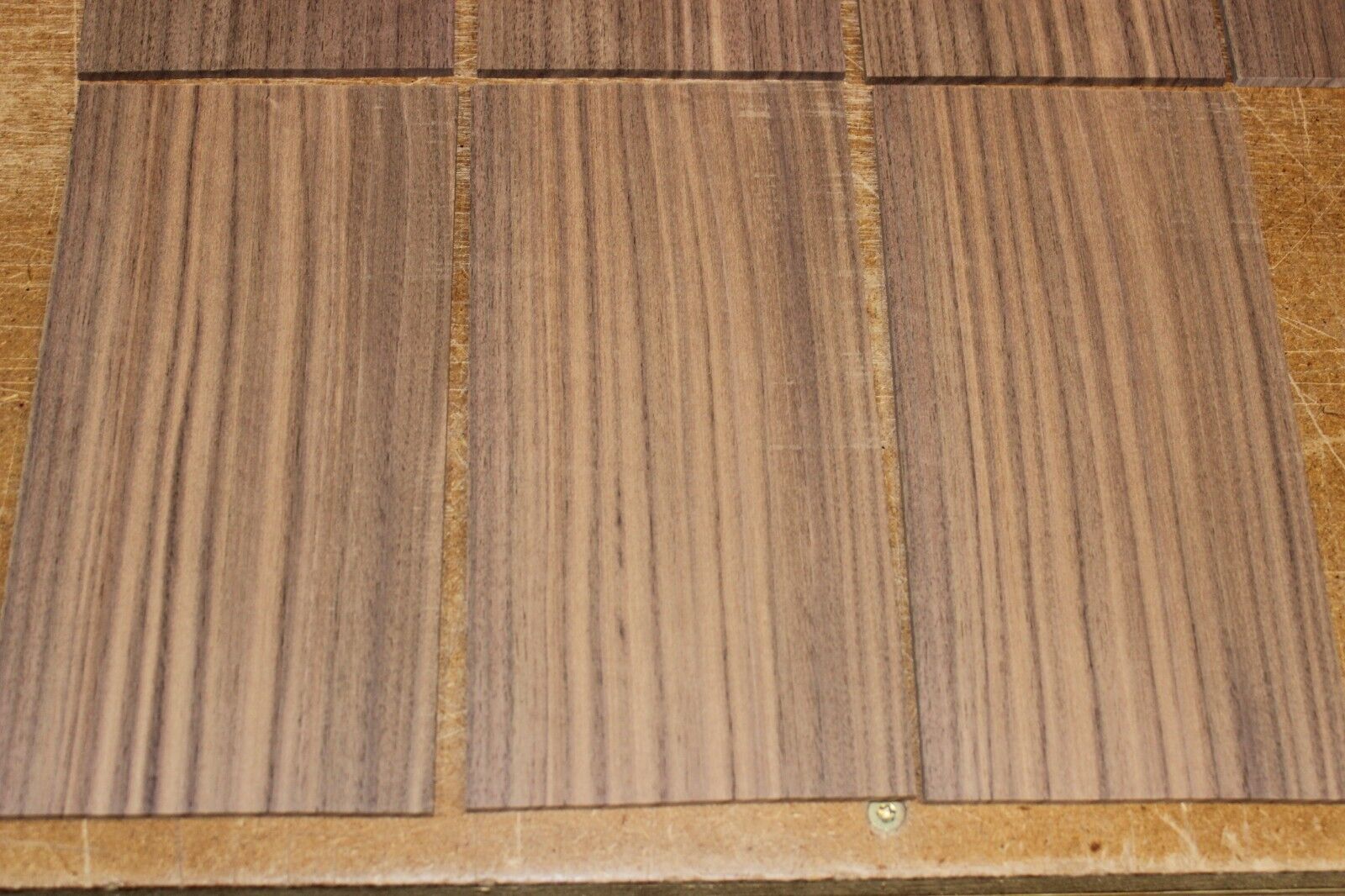 Quarter sawn black walnut headstock / peg head veneer. Sold individually