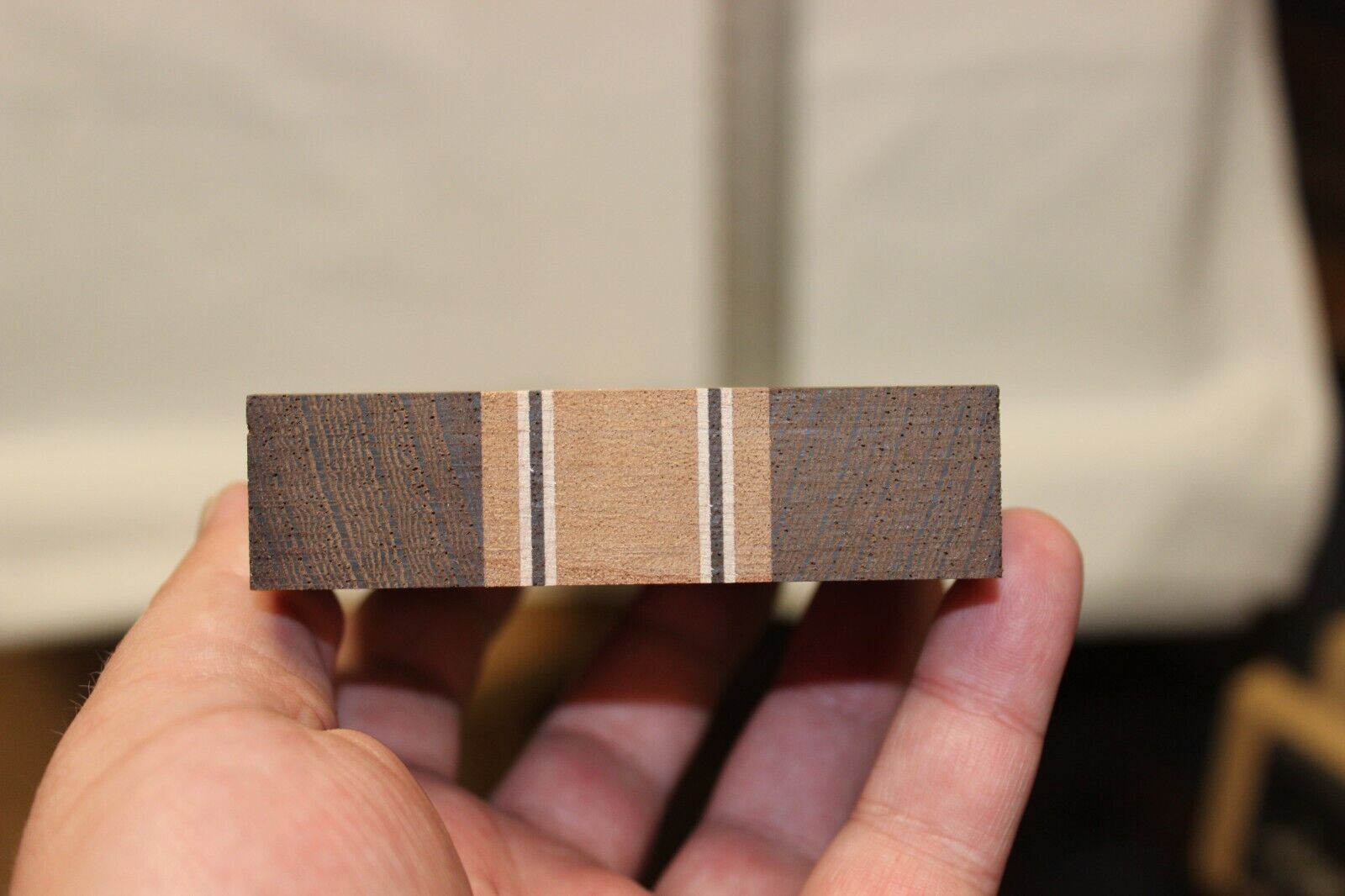 Quilted sapele, wenge and flame maple laminated guitar neck blank.