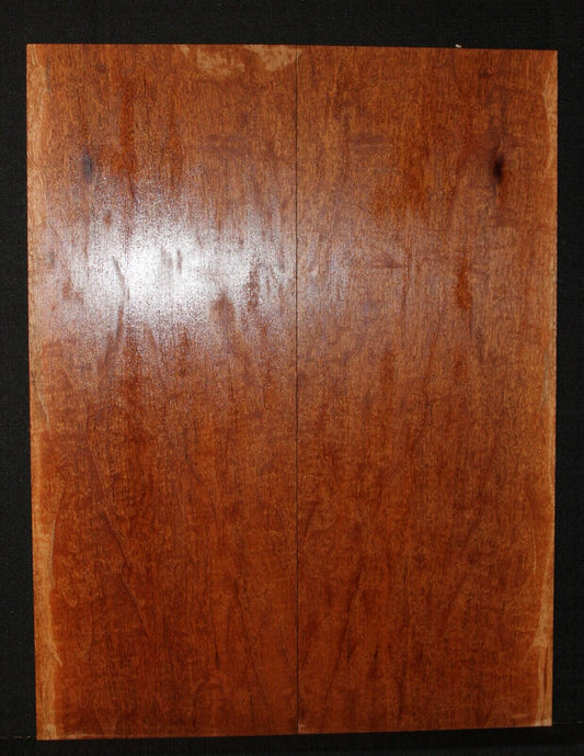 Figured genuine mahogany bookmatched electric guitar drop top.  