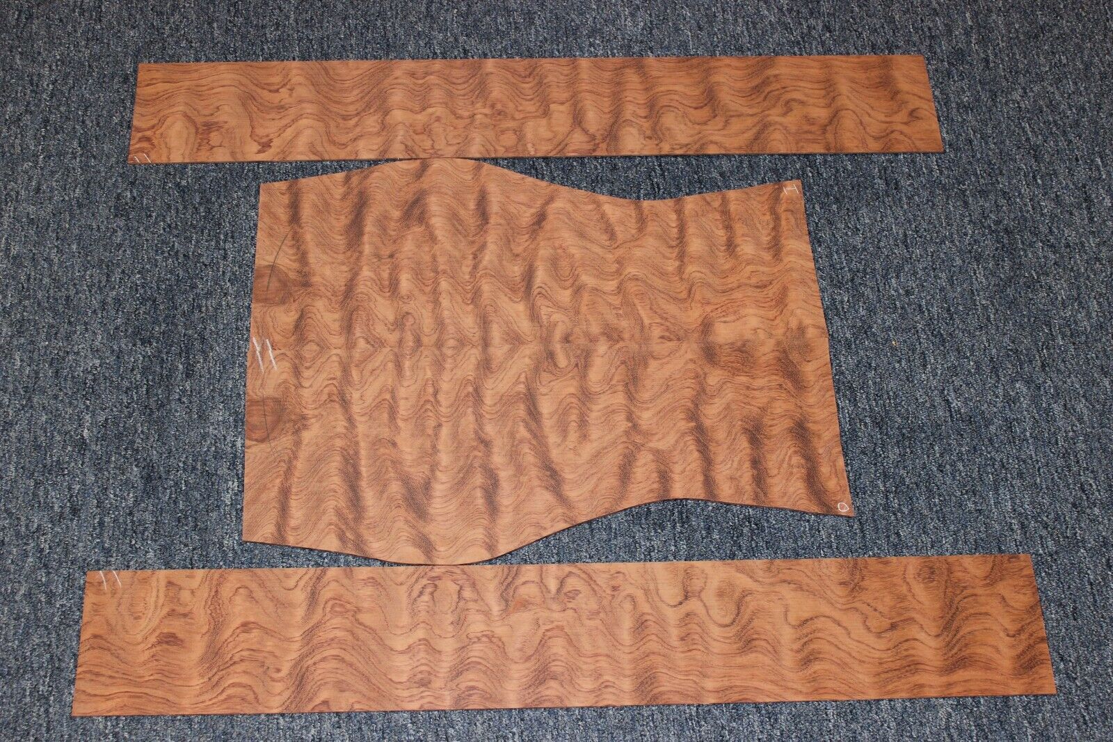 Waterfall figured bubinga  back and side set. Stunning grain, color and figure.