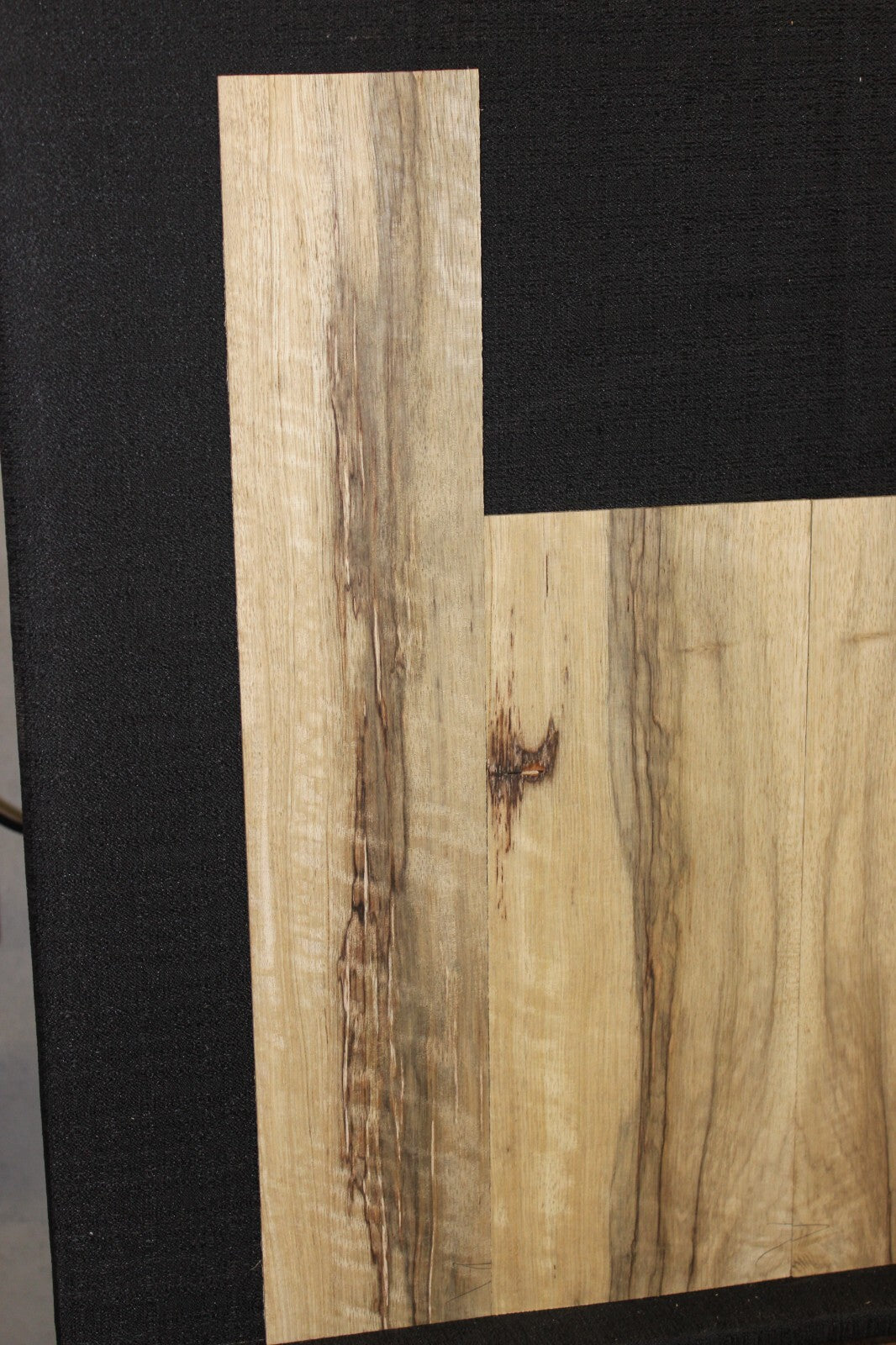 Quarter sawn black limba / korina ukulele back and side set. Tenor size