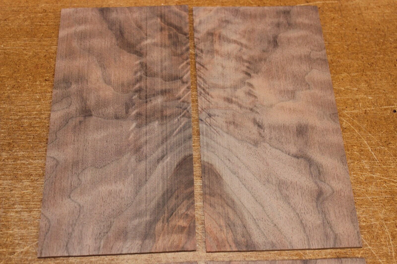 Figured black walnut headstock / peg head veneer. Sold individually