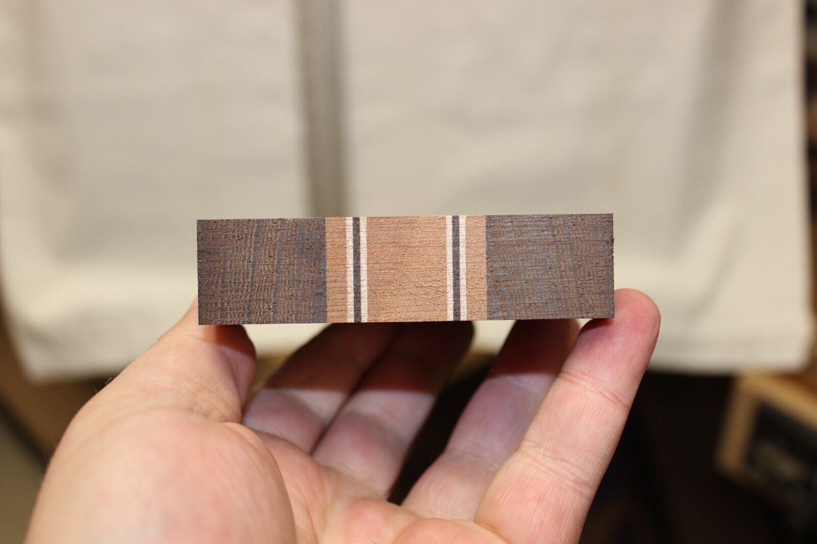 Quilted sapele, wenge and flame maple laminated guitar neck blank.