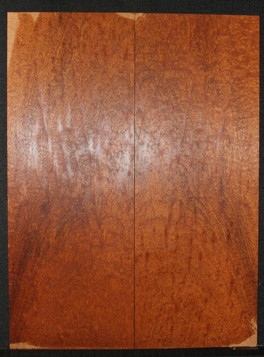 Figured genuine mahogany bookmatched electric guitar drop top.  