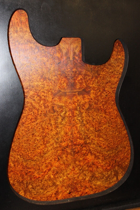 Amboyna burl book matched guitar top.  Personal stash, stunning set.