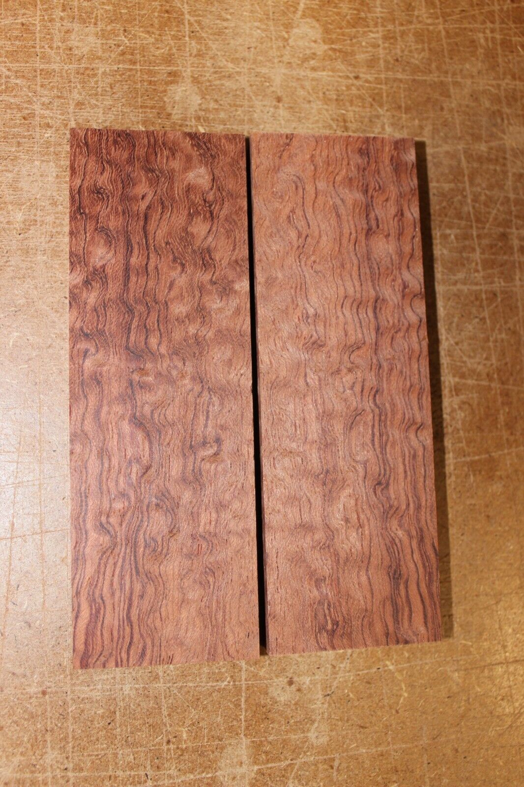 Pomelle figured Bubinga knife scale, gun grip.  5.125  X 1.75 X 3/8"