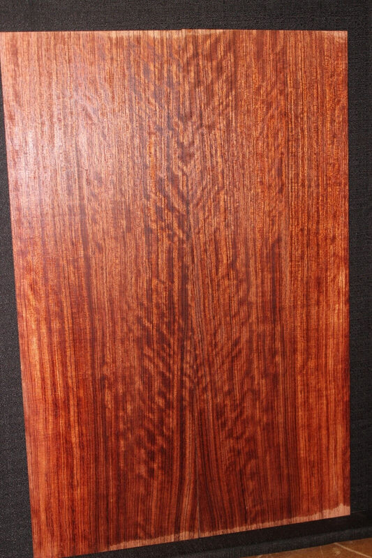 Figured quarter sawn bubinga guitar drop top.