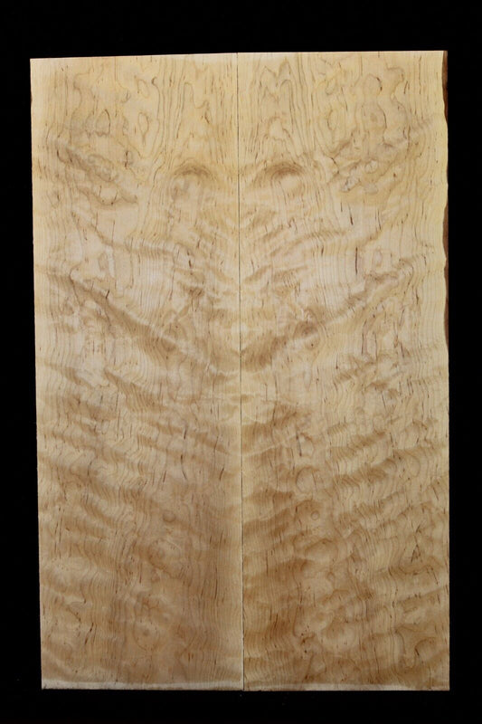 Figured eastern red maple guitar book matched top.