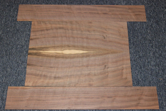 Flame figured black walnut dreadnought size guitar back and side set.