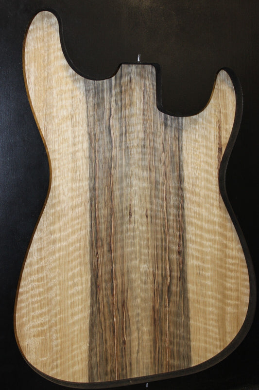 Curly black limba / korina figured book matched guitar top. 0.37" thick
