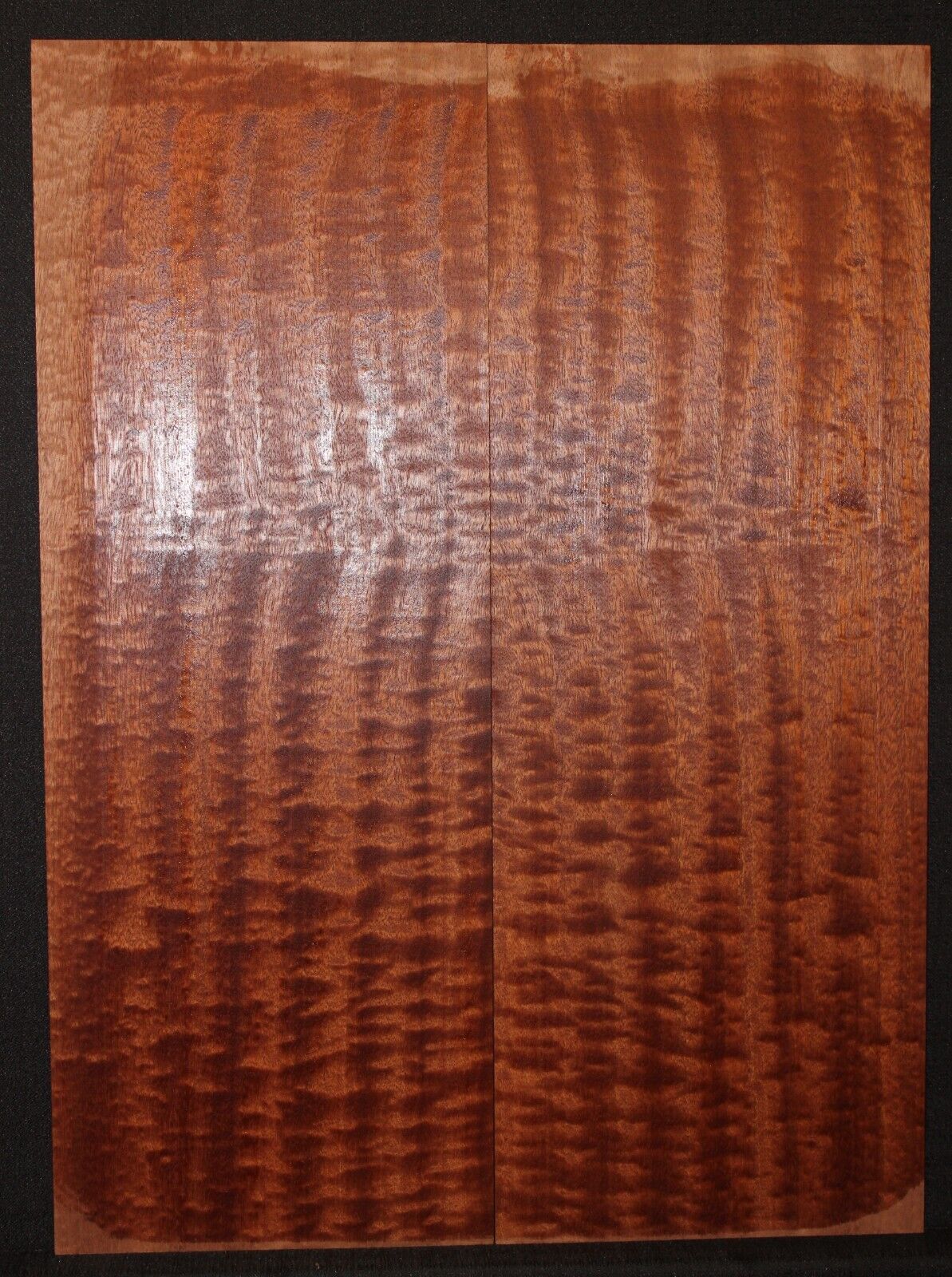 Quilted figured sapele guitar bookmatched drop top.