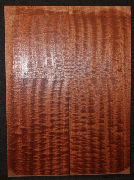 Quilted figured sapele guitar bookmatched drop top.
