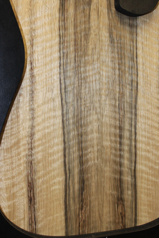 Curly black limba / korina figured book matched guitar top. 0.37" thick