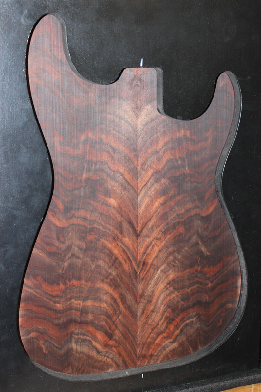 Black walnut crotch  figured book matched guitar top.