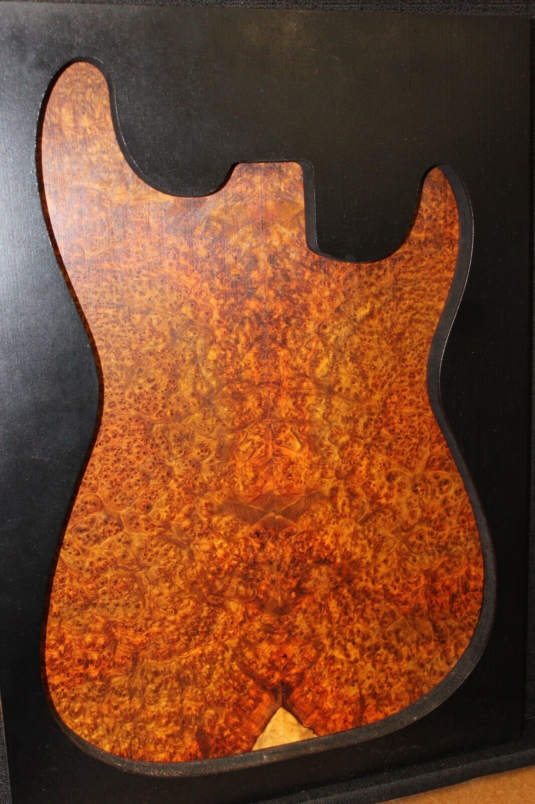 Amboyna burl book matched guitar top.  Personal stash, stunning set.