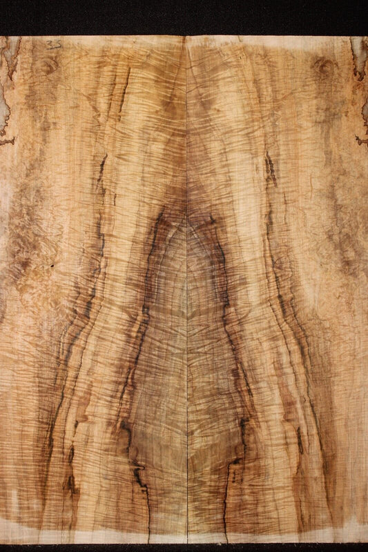 Figured ambrosia maple book matched guitar top, insane figure and color.