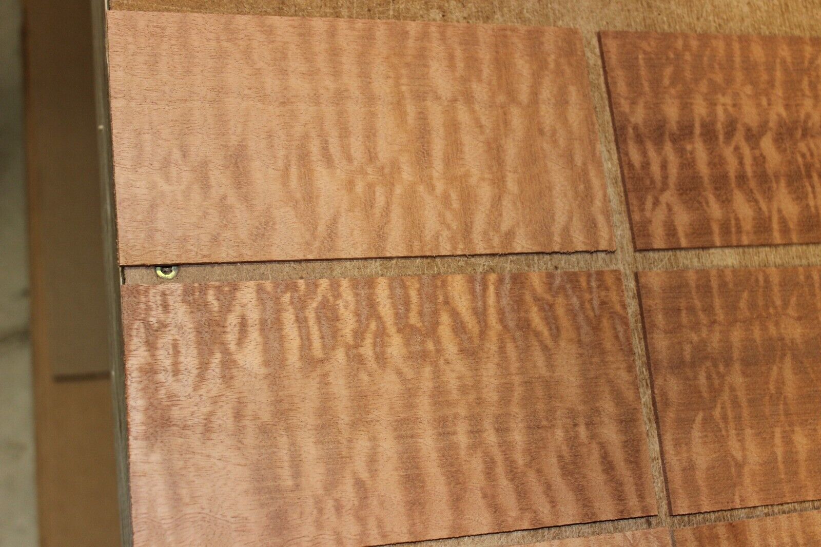 quilted figured sapele headstock / peg head veneer. Sold individually