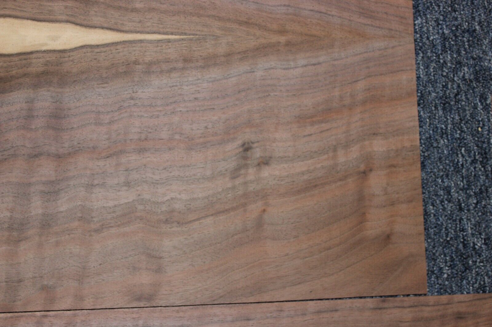 Flame figured black walnut dreadnought size guitar back and side set.