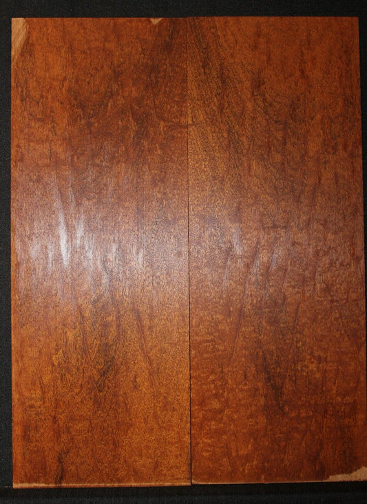 Figured genuine mahogany bookmatched electric guitar drop top.  