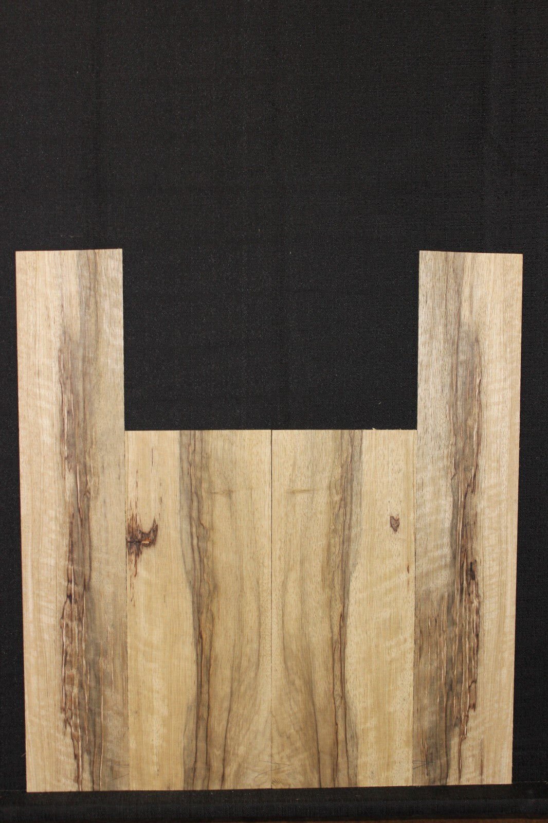 Quarter sawn black limba / korina ukulele back and side set. Tenor size