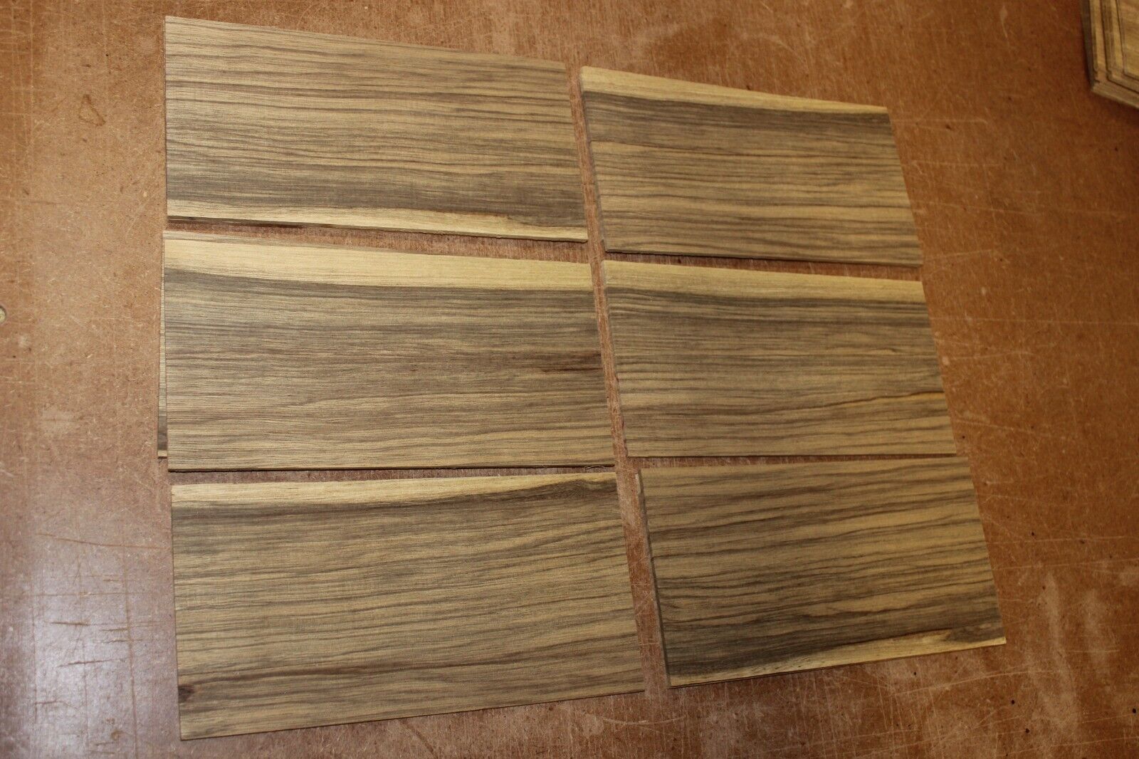 Quarter sawn black limba, korina headstock / peg head veneer. Sold individually