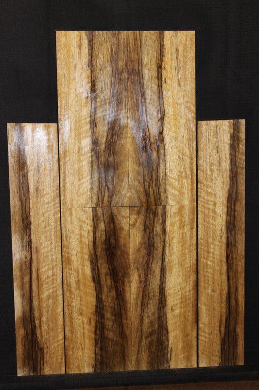 Quarter sawn figured black limba ukulele back, top and side set. Tenor size
