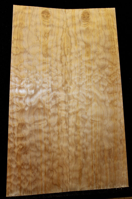 Quilted maple book matched guitar drop top.