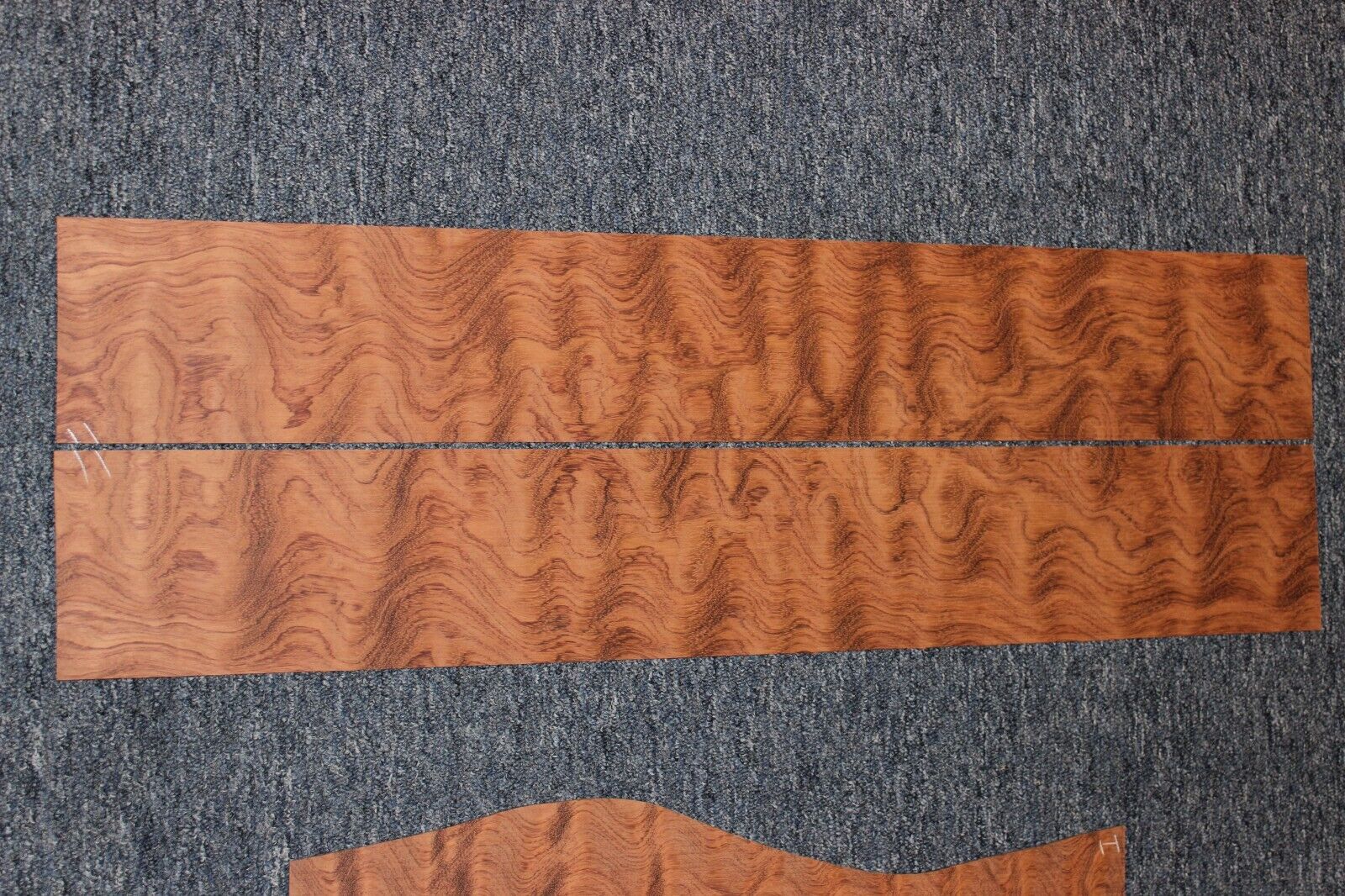 Waterfall figured bubinga  back and side set. Stunning grain, color and figure.