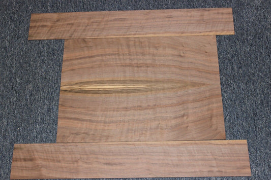 Flame figured black walnut dreadnought size guitar back and side set.