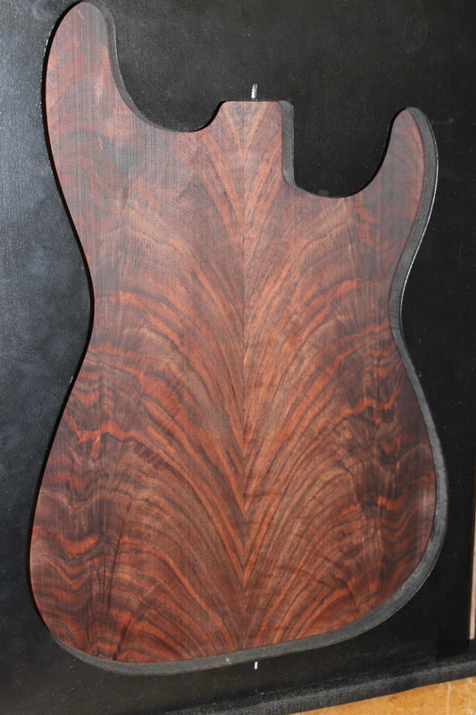 Black walnut crotch  figured book matched guitar top.