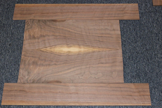 Flame figured black walnut dreadnought size guitar back and side set.