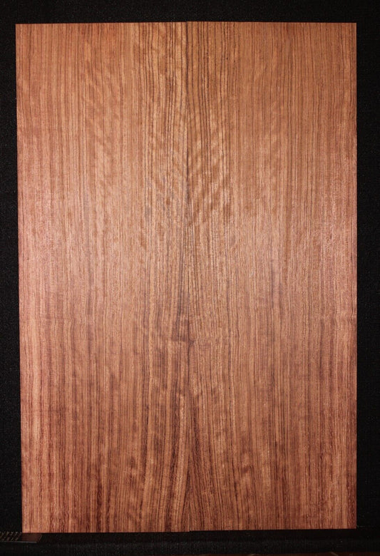 Figured quarter sawn bubinga guitar drop top.