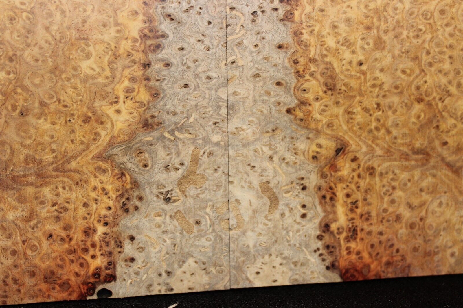 Amboyna burl book matched guitar top.  Personal stash, stunning set.