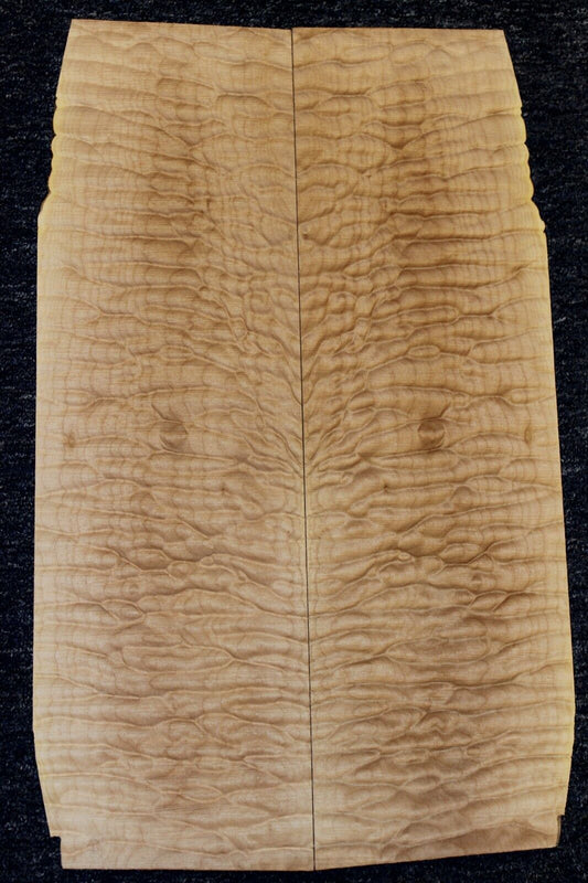 Quilted maple book matched guitar drop top. 5A figure