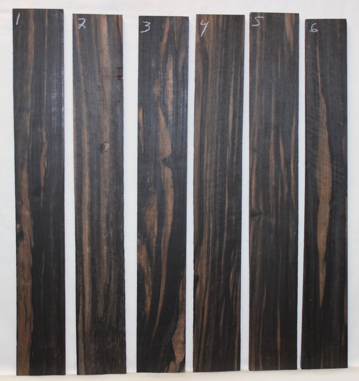 Gaboon ebony guitar fingerboard blanks.  Wild color, pale moon ebony like look.