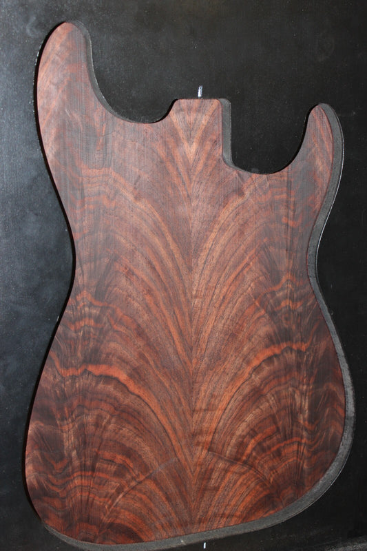 Black walnut crotch  figured book matched guitar top.
